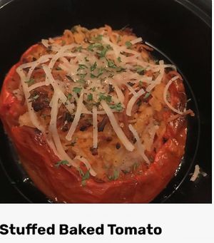 Loved the Stuffed Tomato with rice and cheese - so good at Gaia's Kitchen and Catering in Raleigh