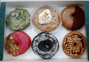 Donut flavors: Matcha, Earl Grey, Tiramisu, Raspberry, Black Sesame, Peanut Butter & Jelly at O.verte Donuts 오베흐트 도넛 in Seoul