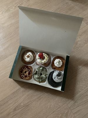 Top row: Earl Grey, Strawberry Shortcake, Garlic & Cream Cheese. Bottom row: PB&J, Matcha, Black Sesame.  at O.verte Donuts 오베흐트 도넛 in Seoul