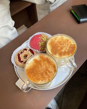 Pb and J donut, raspberry and pistachio donut, 1 iced and 1 hot pumpkin spiced latte  at O.verte Donuts 오베흐트 도넛 in Seoul