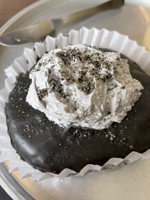 Vegan donut with black sesame and cream  at O.verte Donuts 오베흐트 도넛 in Seoul