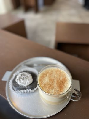 Vegan donut with black sesame and cream and pumpkin spice   at O.verte Donuts 오베흐트 도넛 in Seoul