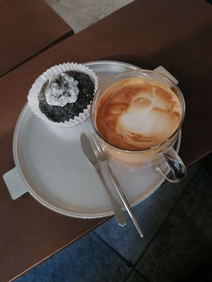 Black sesame Donut and a latte at O.verte Donuts 오베흐트 도넛 in Seoul