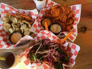 Fried pickles with house made sauce, sweet potatoe fries with cashew based chipotle sauce abs house made ranch, brussel sprouts with kale slaw   at Lily's Snack Bar in Boone