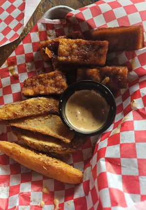 Tofu wings, tater wedges, and vegan lily sauce!! at Lily's Snack Bar in Boone