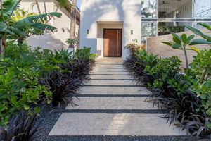Walk way to our restaurant and pool area  at Mother Earth Vegan Hotel in Tamarindo
