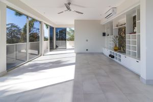 Rooftop yoga + healing studio can be fully opened to allow for natural air flow at Mother Earth Vegan Hotel in Tamarindo