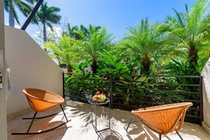 Each of our rooms has a private outdoor terraces with acapulco rocking chairs  at Mother Earth Vegan Hotel in Tamarindo