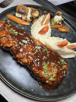 Bbq Ribs (Eggplant)  at Mother Earth Vegan Hotel in Tamarindo