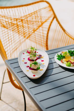 Vibrant, living foods are beautifully served at our poolside eatery. at Mother Earth Vegan Restaurant in Tamarindo