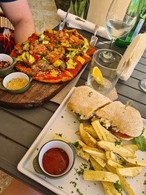Mother Pizza and Tuna Sandwich at Mother Earth Vegan Restaurant in Tamarindo