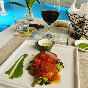 Zucchini cannelloni with an Argentinian malbec   at Mother Earth Vegan Restaurant in Tamarindo