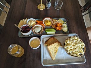 Sampler platter, vegan grilled cheese with popcorn, and mojito kombucha at Cultured South Fermentation Co in Atlanta