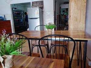 Indoor tables at Healthy Choices Bakery and Sandwich Shop in Mondulkiri