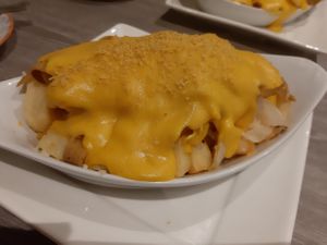 Seitan 3 cheese combo with chips at Harry's Place CIC in Ballynahinch