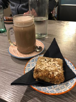 Hot chocolate and apple oat slice  at Harry's Place CIC in Ballynahinch