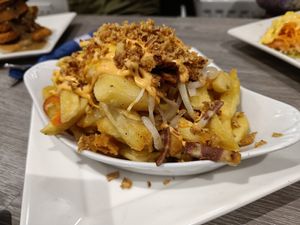 Joey fries (3 vegan cheese, bacon, onion and peppers) at Harry's Place CIC in Ballynahinch