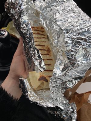 The size of twister (inside 3 nuggets) with tomatoes, salad and majo- yougurt like sous at Wege Gang in Lodz