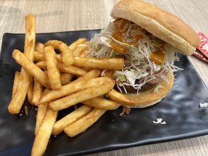 Hokkaido salmoniee burger with spicy curry sauce (very stingy with the sauce I must say!)  at Greendot 绿一点 - Jurong Point 1 in West Singapore