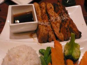 voodoo sticks: grilled soy beef and pepper kabobs served with rice and steamed vegetables at Red Bamboo in New York City