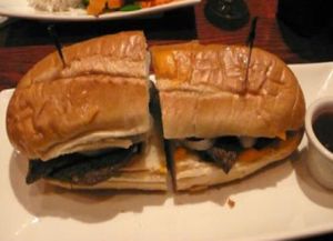 philly cheesesteak: tender marinated soy beef chunks layered over caramelized onions, ... at Red Bamboo in New York City