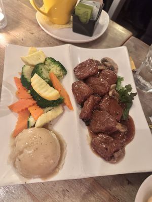 Dante’s Cuisine (soy beef w/ mushroom gravy)  at Red Bamboo in New York City