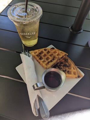Coconut oolong tea with half order of chocolate chip waffles at Brooklyn Tea in Atlanta