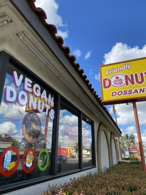 Big sign on the window  at Friendly Doughnuts in Orange
