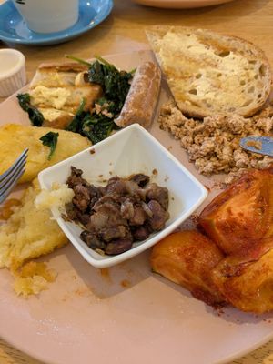 Yummy sausage, hash browns, tomatoes, spinach, tofu & homemade beans. at Vibes in Dorchester
