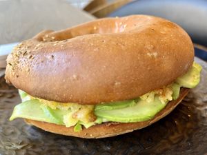 bagel with avo and hash browns   at Kynd in Edinburgh
