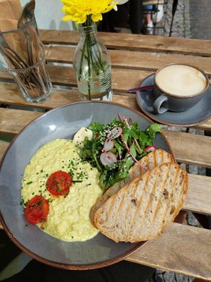 "Scrambled Vegg" (11.9) + Cappuccino (3.8) at Mana Food - Moabit in Berlin