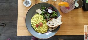 Scambled vegg (scrambled tofu, cherry tomatoes, side salad served with toasted bread) at Mana Food - Moabit in Berlin