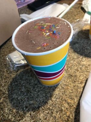 Oat milk frosty! Chocolate strawberry mixed with rainbow sprinkles!  at PLNT Burger in Alexandria