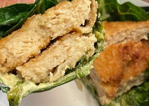 Crispy Chik"N Sandwich sub with Swiss Chard Wrap and added crispy onions at PLNT Burger in Alexandria