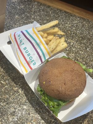 Plant based cheeseburger and crispy herb fries!  at PLNT Burger in Alexandria