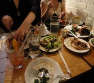Happy vegans feasting :-) at Sacred Chow in New York City