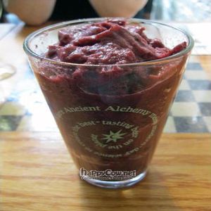 Very Berry Smoothie bananas, strawberries & blueberries, apple juice at Sacred Chow in New York City