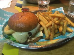I tried their limited edition-burger called ”Pepper jackie”. It was a beyond burger with perfect texture and onion rings on top. Both crispy and greasy. 
Fries are included. at BABAS - Högdalen in Bandhagen