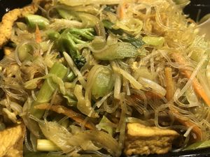 Singapore noodle is pretty good. Has some heat. Feeling good smoothie is just fine. Not sweet enough for me   at Trendy Vegan in Houston