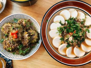 Braised tofu-stuffed bitter melon. and silken tofu with shiitake mushroom  at Earth Cafe in Dong Hoi