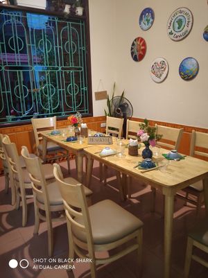 Reserve table in advance for the best service at Earth Cafe in Dong Hoi