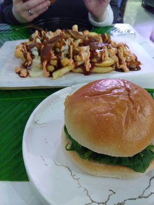 Vegan chicken burger and loaded fries at MAAD in South West London
