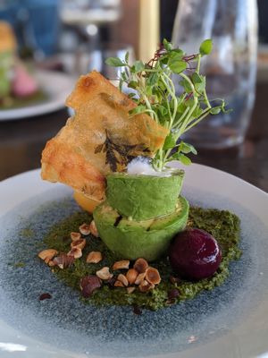 Grilled avocado salad with hazelnuts, almond cream, pickled baby
beetroot, salsa verde & potato crisp at 8 at Trinity in Morisset Park