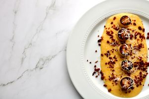 Seared hearts of palm “scallops” with creamy corn purée and seitan chorizo crumble. at SoCo Vedge in Narragansett