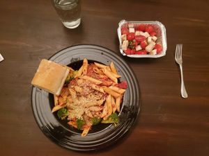 Penne with meatballs and broccoli, garlic bread, and a salad of tomato & Barrett's Garden mozz. at SoCo Vedge in Narragansett