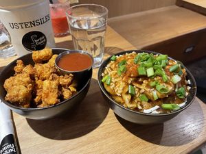 Cauliflower bites, poutine  at Burger Fiancé in Montreal