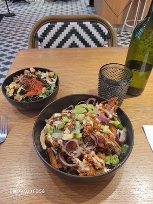 Fiancé poutine and caesar salad at Burger Fiancé in Montreal