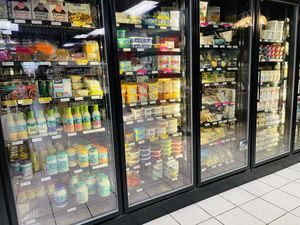 Refrigerated section w/vegan options galore  at Green Planet Grocery in Syracuse