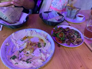 Hummus and tahini with pitta bread
Also ordered a side of vegetables and a pitta wrap. All lovely. Great branding lovely owner at Hummus and Company in Barcelona