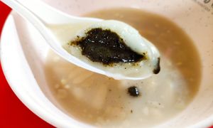 Sesame filling rice ball at 75 Ah Balling Peanut Soup 花生汤圆 - Chinatown in Central Singapore
